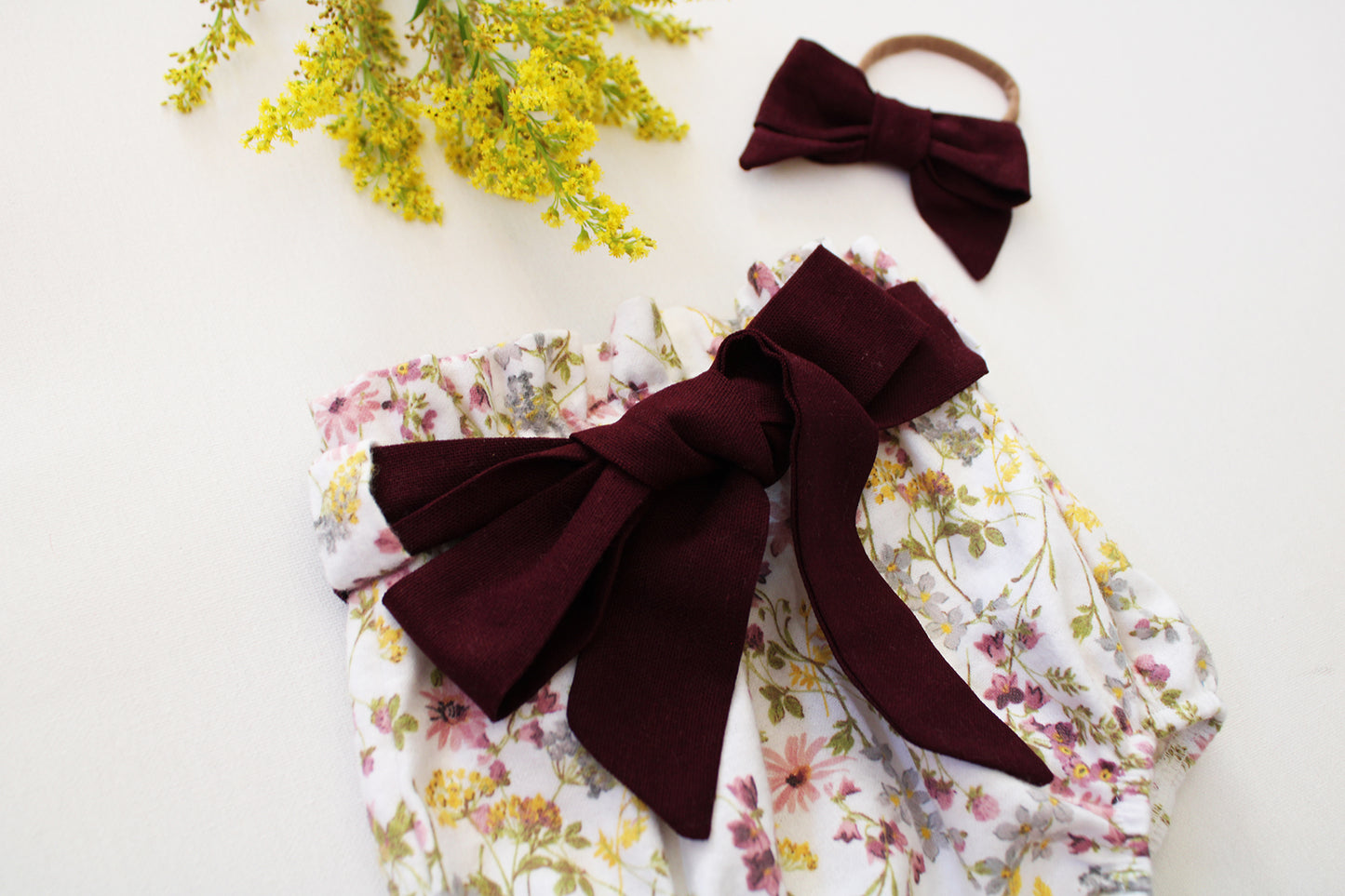 The Amber Wildflower Bloomer with Black Cherry Belt (onesie + accessories sold separately)
