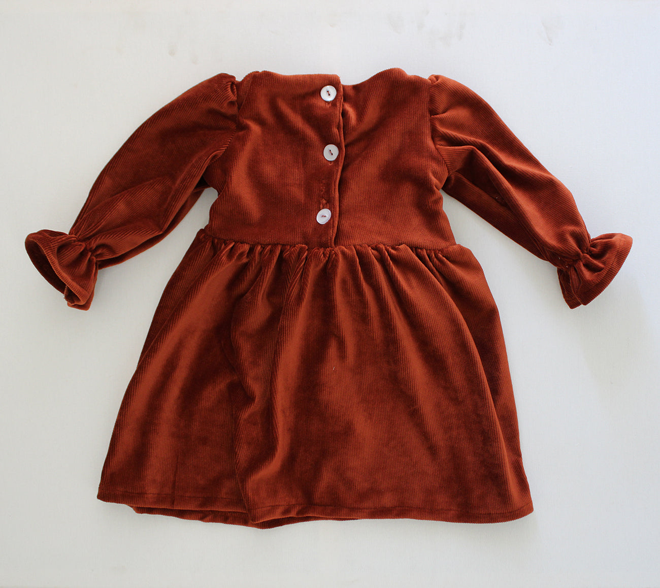Magnolia Long Sleeve Dress - Stretch Corduroy Rust (headband sold separately)